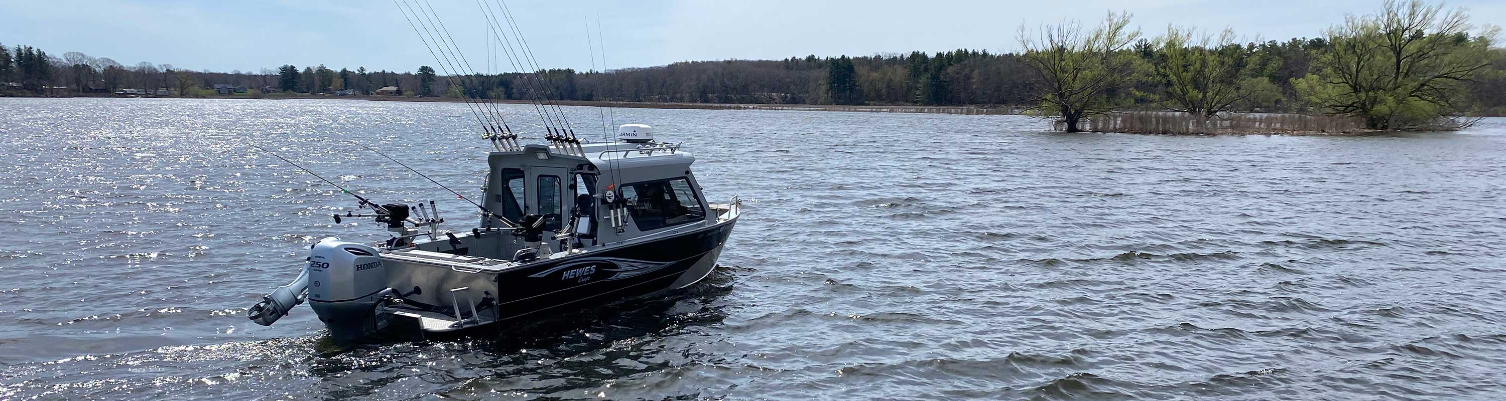 photo of the Hewes Craft boat entering Salmon River estuary