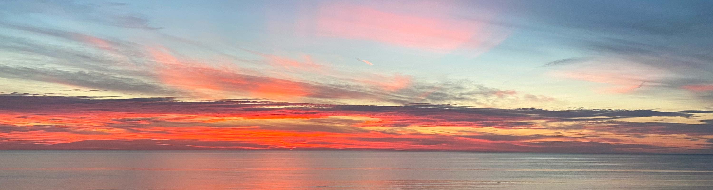 photo of sunset over Lake Ontario in summer